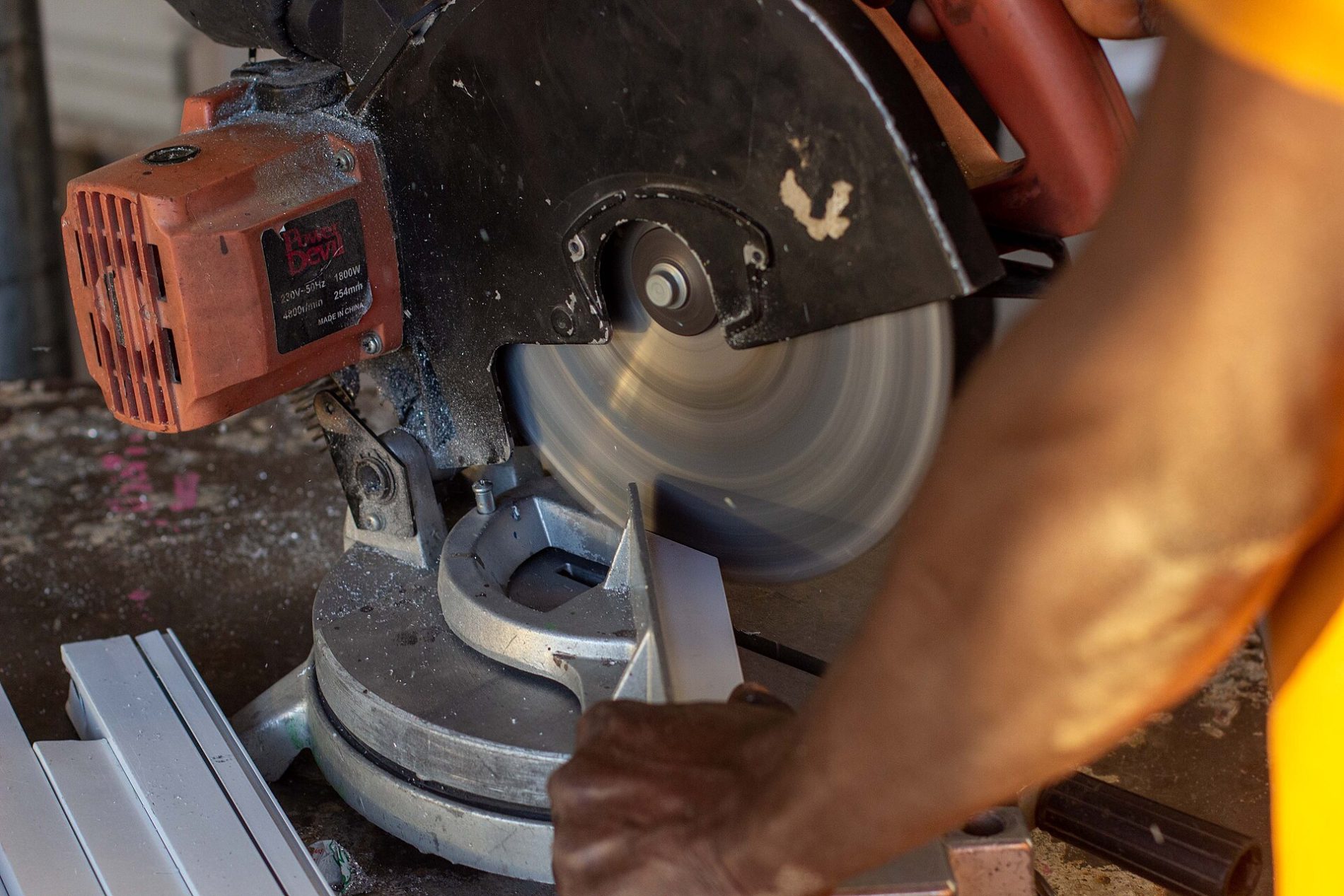 Glazier cutting and installing glass in Northern Nigeria (30)